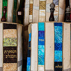 Decorative Torah covers made by Susan Leviton