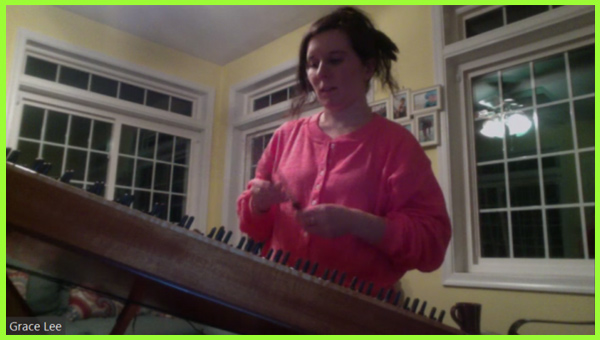 Grace Lee plays the hammered dulcimer for her teacher during a virtual lesson.