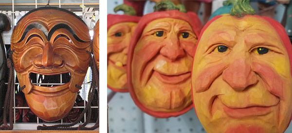 LEFT: A Talchum mask in a shop in South Korea, of a laughing man with prominent eyebrows and eyes squinched shut. It is medium-brown wood with black eyebrows and a suggestion of black hair at the very top. RIGHT: Three faces carved in wood and painted to look as though they're carved into a real pumpkin's flesh.  Each is an oval with orange 'rind' around the edges and a green pumpkin stem at the top. The faces are painted golden yellow with peach highlights on cheeks, noses and chins. The faces are of jowly elderly men with very realistic eyes.
